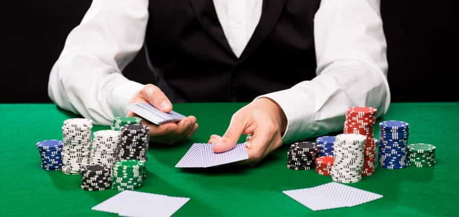 A casino croupier dealing cards.