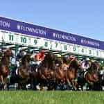 Horses burst from the starting stalls at Melbourne’s Flemington Racecourse. ©GettyImages