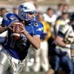 An American football player playing the quarterback position.