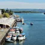 Boats along a river dock in Valdivia, Chile.