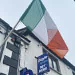 An Irish flag flies outside a BoyleSports betting shop.